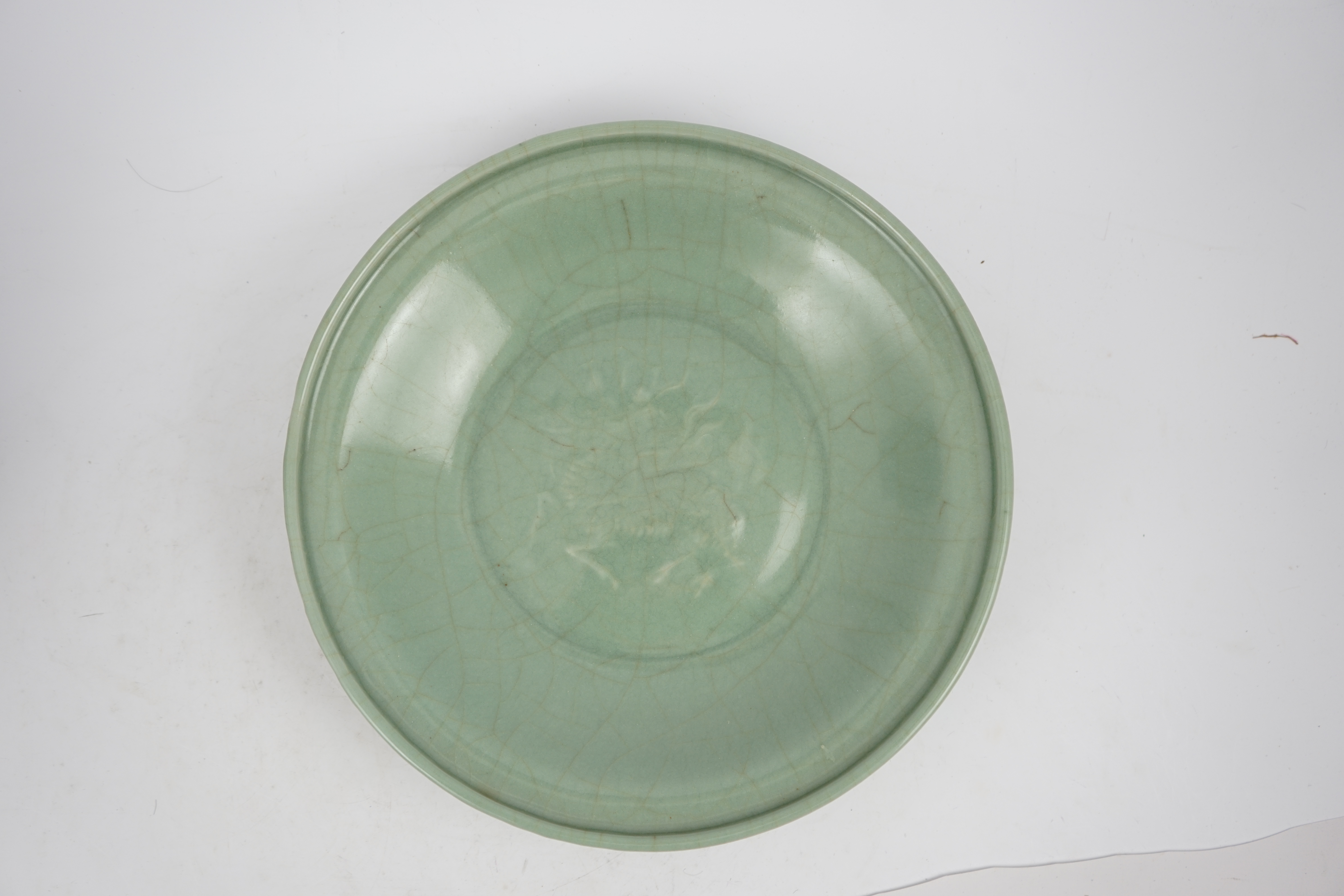 A Chinese Longquan celadon 'qilin' dish, 15th/16th century